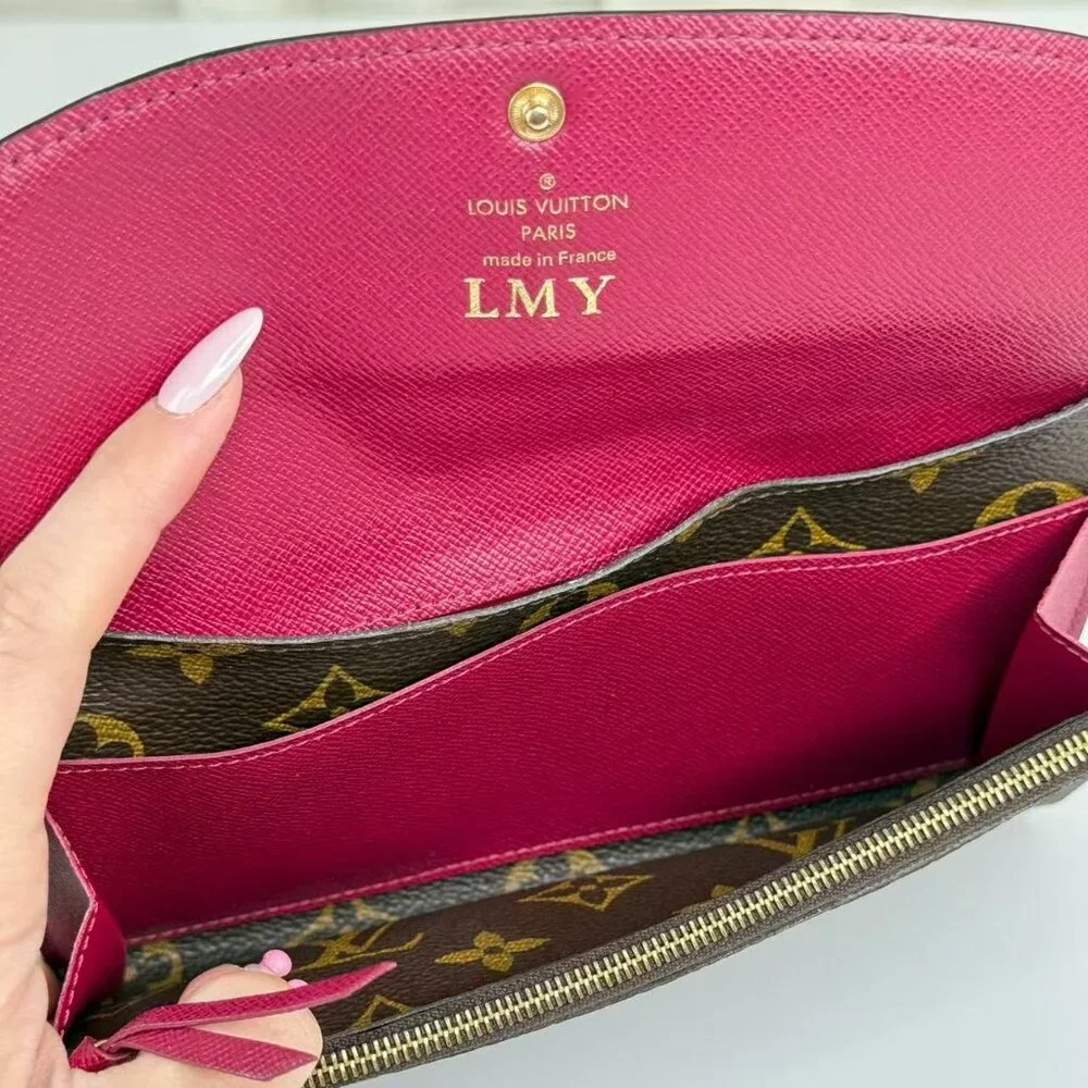 Louis Vuitton Monogram Canvas Wallet with Classic LV Pattern and Red Button